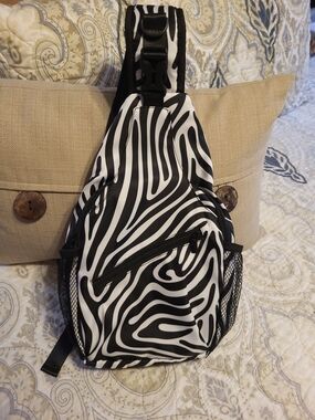 NWOT Zebra Print Sling Backpack - Black & White
